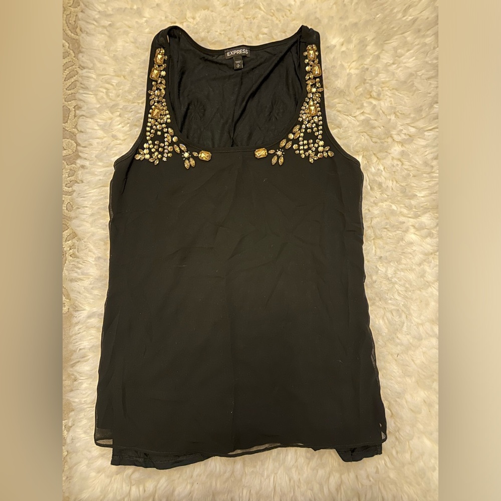 Express embellished top.